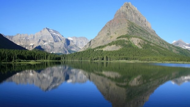 GLACIER NATIONAL PARK, USA The one million acre Glacier National Park wilderness area is located in the state of Montana and the Canadian provinces of British Columbia and Alber...